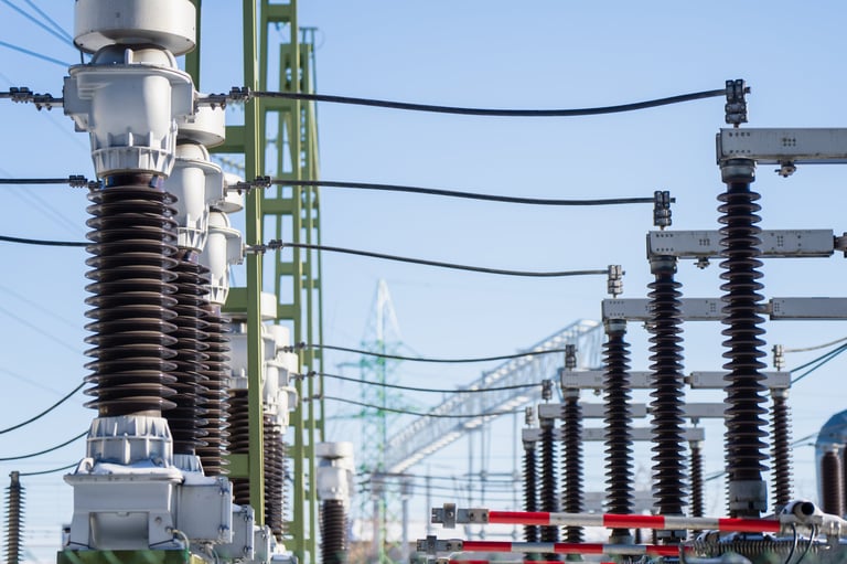 High voltage substation with tall ceramic insulators and busbars